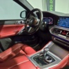 BMW X6 M50i 2023 seminuevo en Monterrey — $1,399,900 thumbnail 12