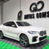 BMW X6 M50i 2023 seminuevo en Monterrey — $1,399,900 thumbnail 3