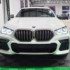 BMW X6 M50i 2023 seminuevo en Monterrey — $1,399,900 thumbnail 5