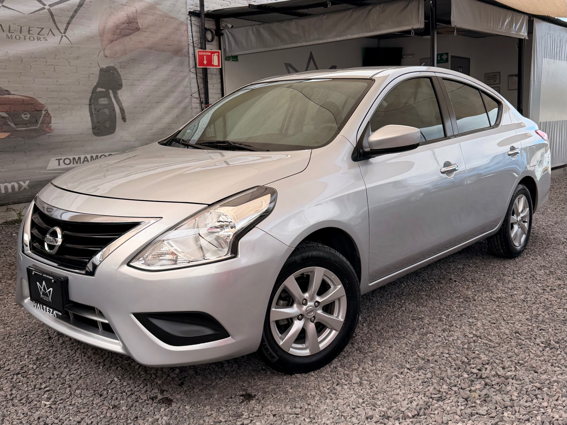2019 Nissan Versa Sense Aut — imagen 1
